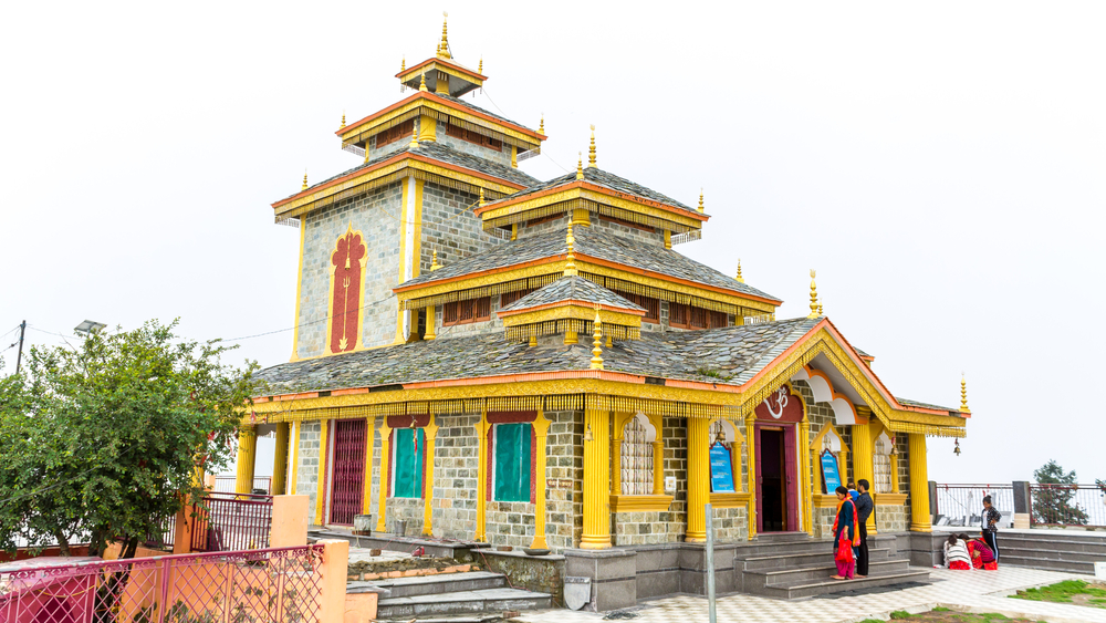 a Golden bordered temple with monastery architecture