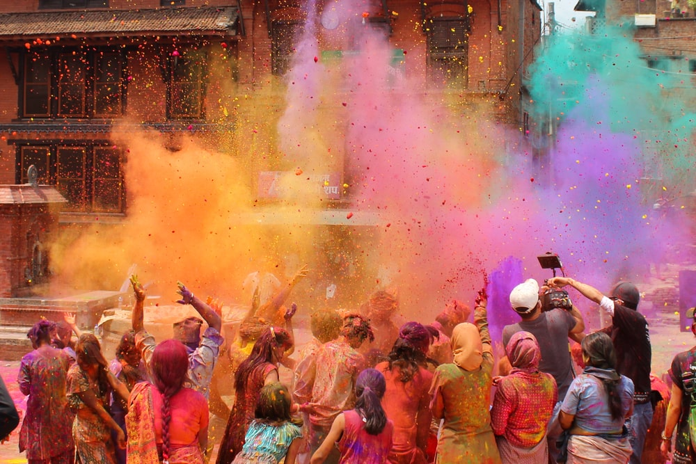 Splashing holi colours in the air