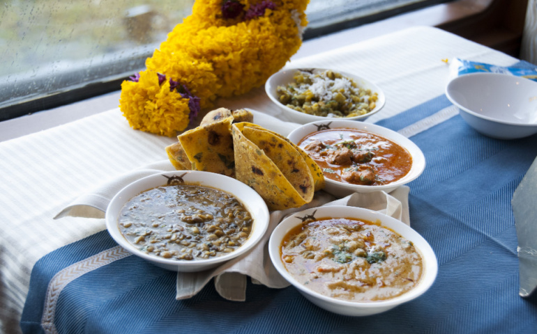 Delicious Indian food for tourist at Peshwa Restaurant on board the Deccan Odyssey Train.