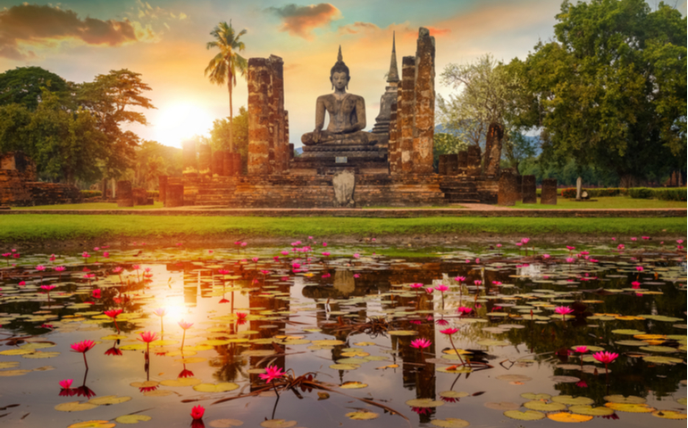 Wat Mahathat Temple in the precinct of Sukhothai Historical Park, a UNESCO World Heritage Site in Thailand.
