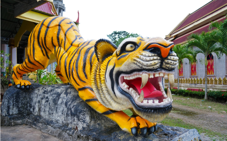 One of the many tiger statues inside Tiger Balm Park or Haw Par Villa