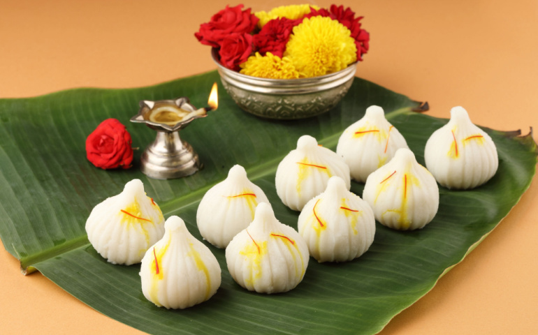 Steamed Modak, made from rice flour and coconut jaggery filling. Modak is a traditional Indian sweet made during Ganesh Utsav and also offered to lord Ganesha.
Image Credit: SMDSS / Shutterstock