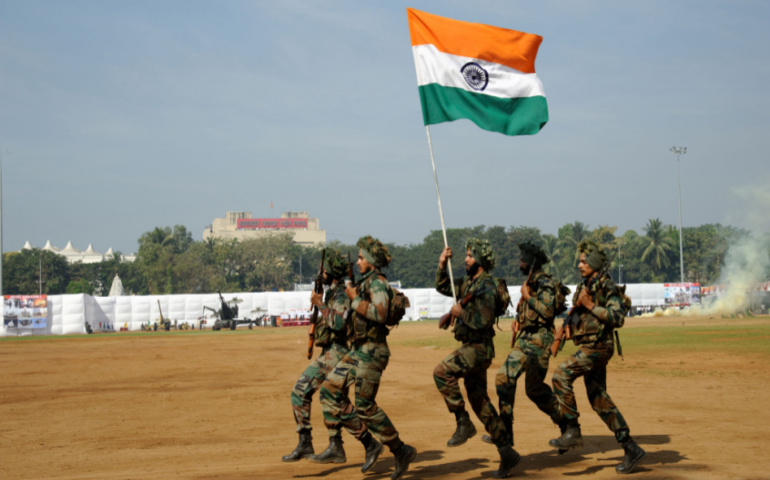 Indian army Parade rehearsal performing stunt holding national flag