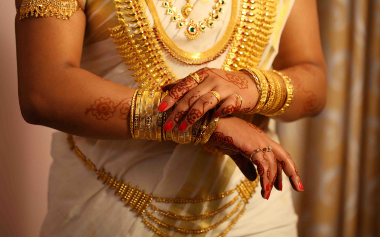 An Indian bride decked in gold jewelry