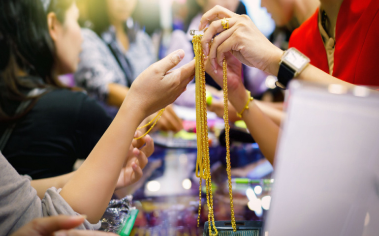 Customers are buying gold jewelry in the gold souk