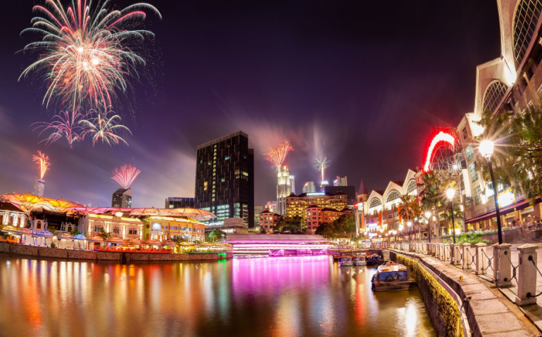 Fireworks set off in the backdrop to the Singapore River along Clarke Quay