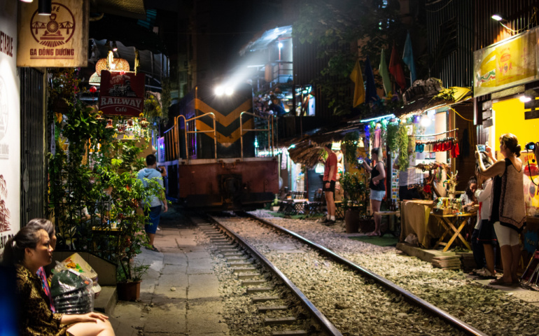 Train street in Hanoi at night.