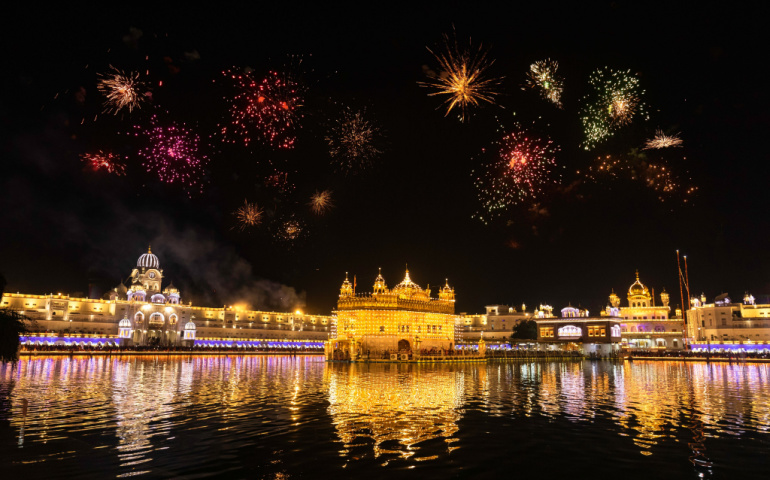 Golden Temple Amritsar lit by Diya and fire crackers during Diwali