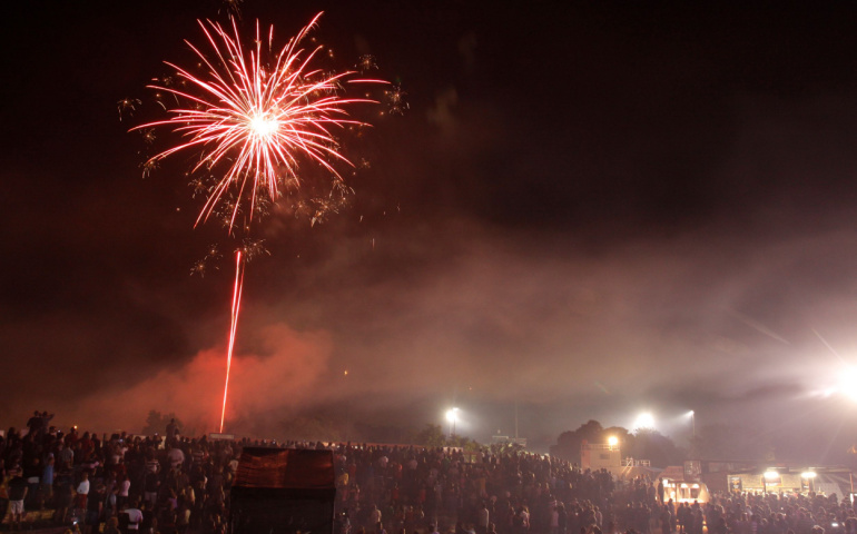 People gather around to witness New Year fireworks in South Africa