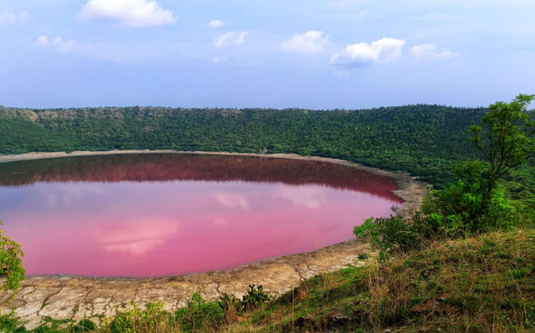 Lonar Lake was created by meteorite impact that occurred around 50,000 years ago and sometimes it turns pink