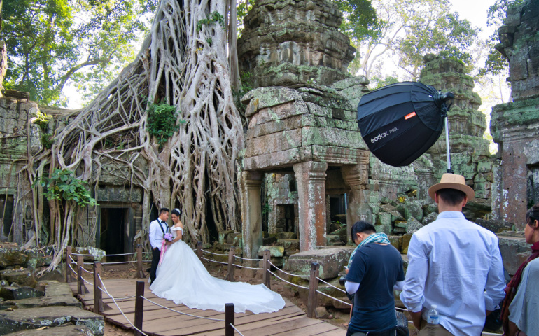 A couple having their photoshoot at Ta Prohm
