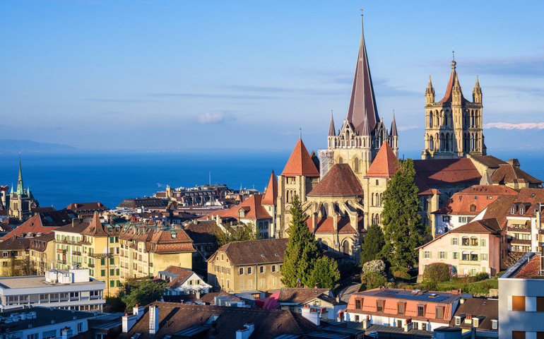 Views of Gothic Cathedral, Old Town Roofs and Lake Geneva
