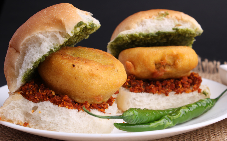 Vada Pav served with  fried green chillies