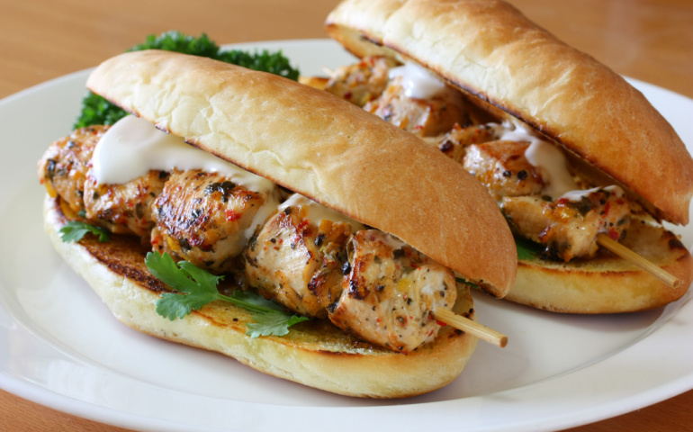 Spiedie served with skewered and grilled  chicken pieces