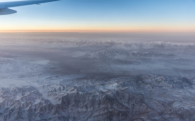 Gobi Desert landscape in winter from the plane at dawn