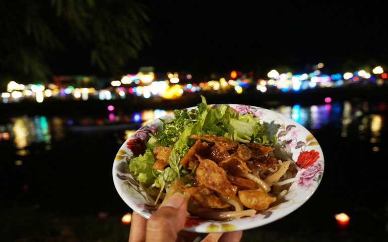 Eating tradiotnal Vietnamese dishes- Cao Lau