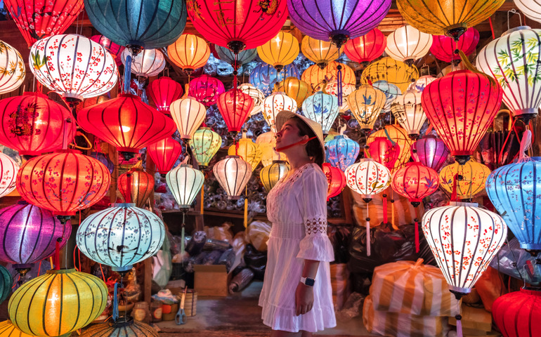 Woman choosing lanterns in Hoi An