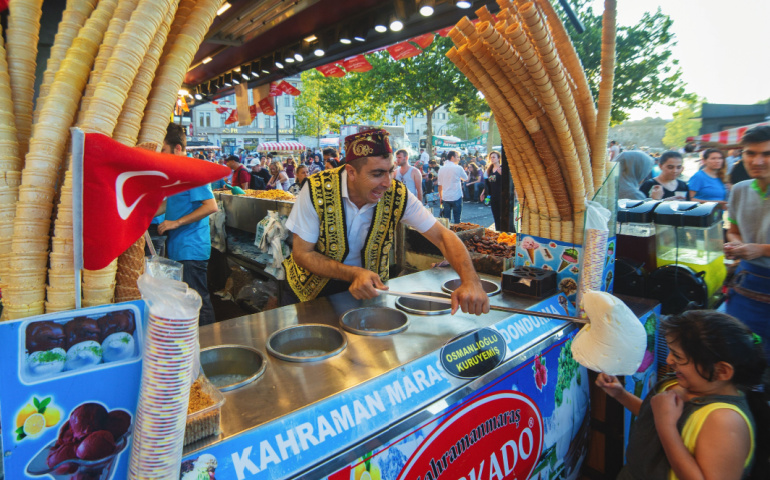 ISTANBUL, TURKEY: Dondurma ice-cream seller dressed in traditional Turkish costume in the street