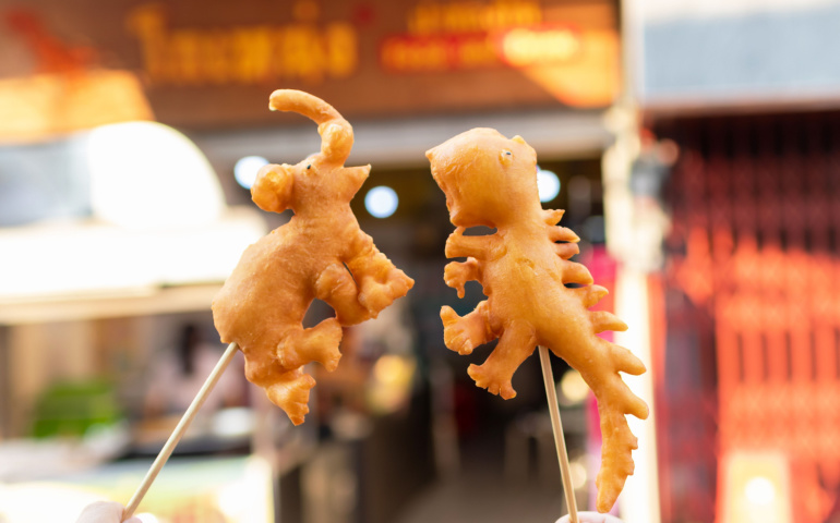 Deep-fried crullers, also known as (Pa Thong Ko). Each deep-fried treat is hand-crafted elephant or dragon