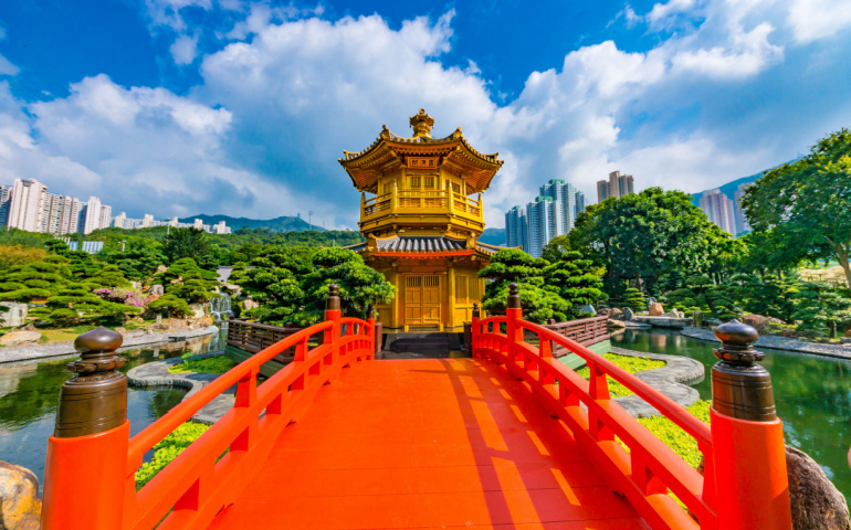 Golden pagoda of Nan lian garden in Hong Kong city with beautiful background