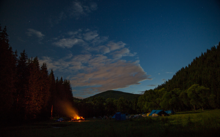 Camping under the night sky 