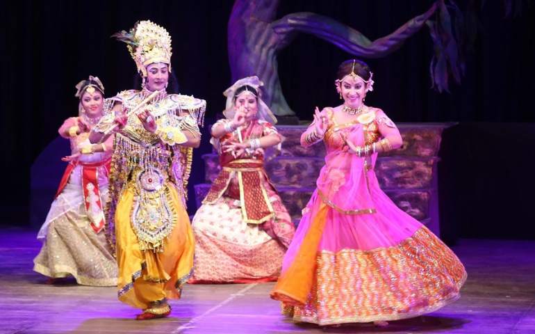 Artists dressed as Lord Krishna and Radha performing Raslila 