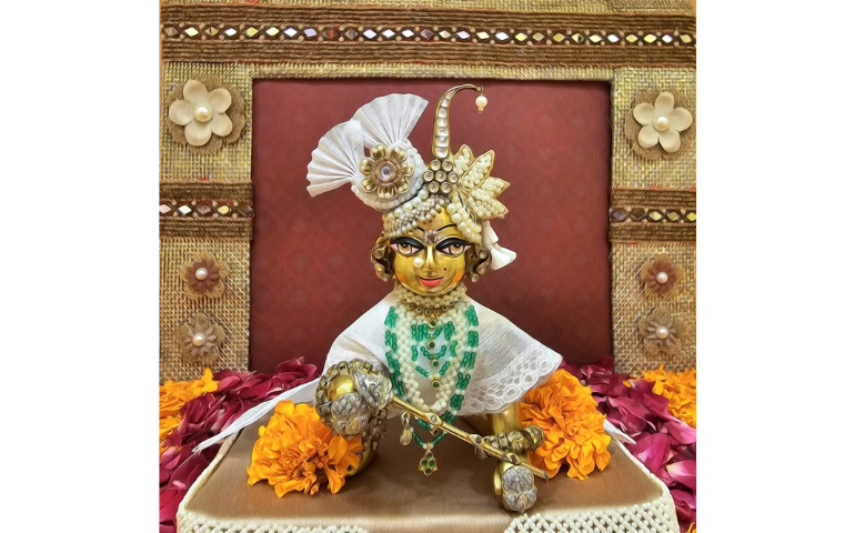 Idol of Bal Gopal decorated for Janmashtami 2023 at the Shrinathji Temple