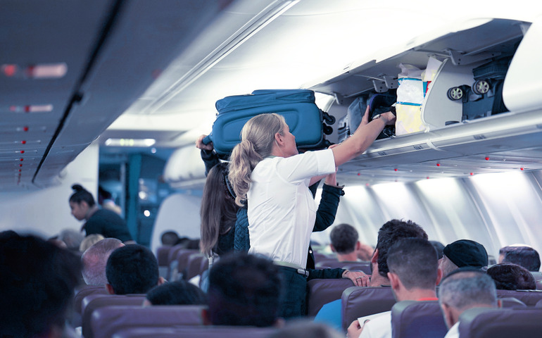 things you should never do on a plane- overhead bin