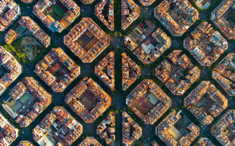 Aerial view of the famous urban grid of Barcelona cityscape. 