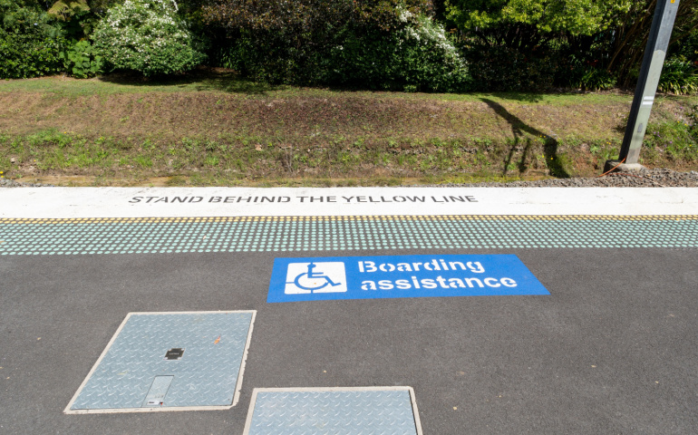 Boarding assistance sign at a railway station platform in Australia