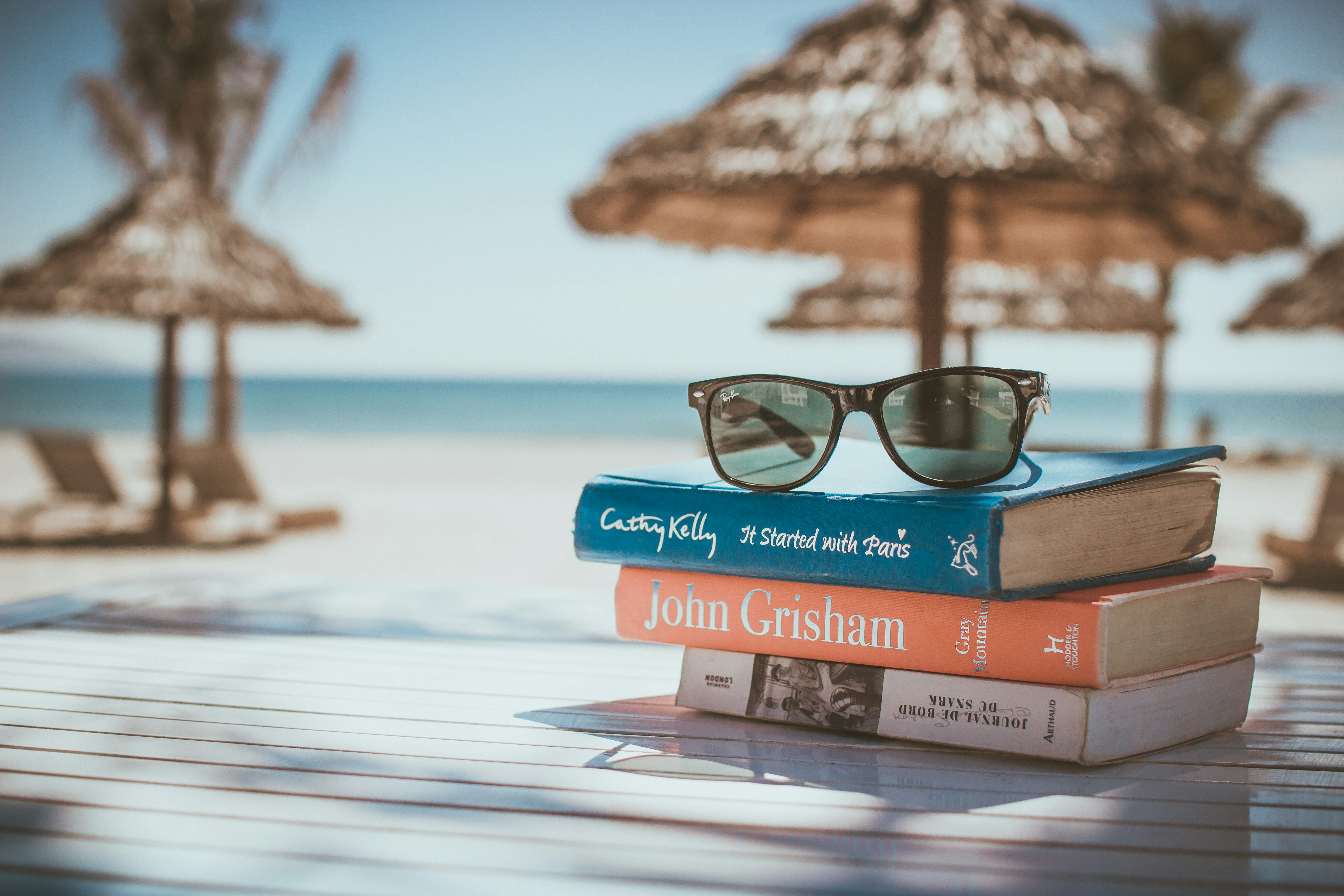Books and glares on the beach