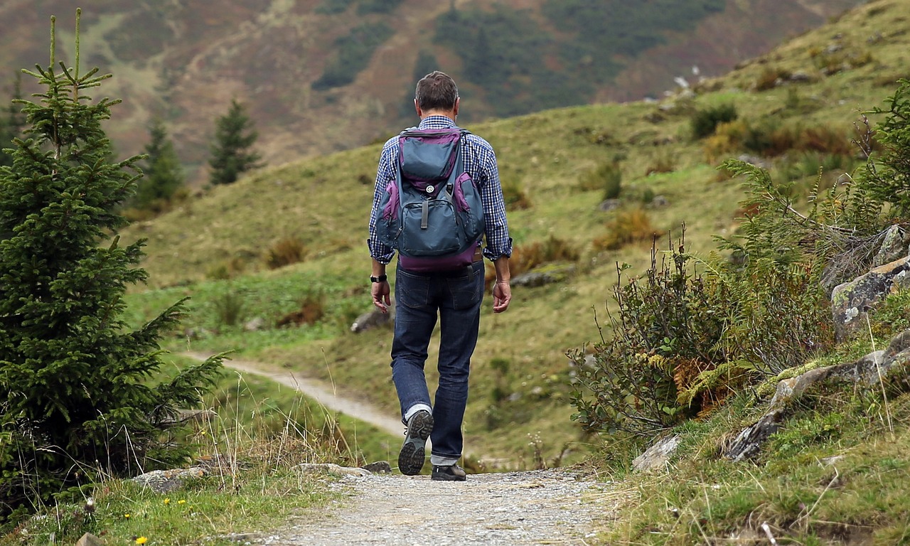 A man hiking up the mountain