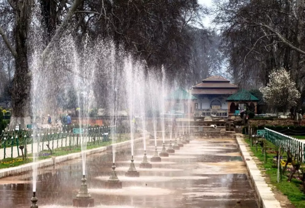 Tiered lawns, flowing fountains, and precisely arranged flowerbeds.