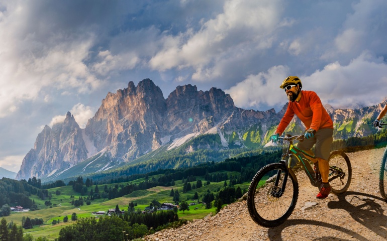 Cycling in the mountain trail. 
