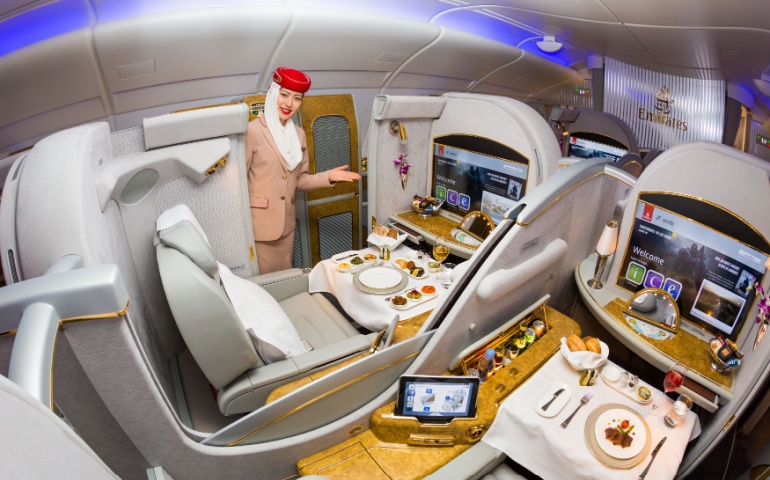 Emirates Airline first class. Onboard food, dining. Luxury travel. Airbus A380. First class suite.
