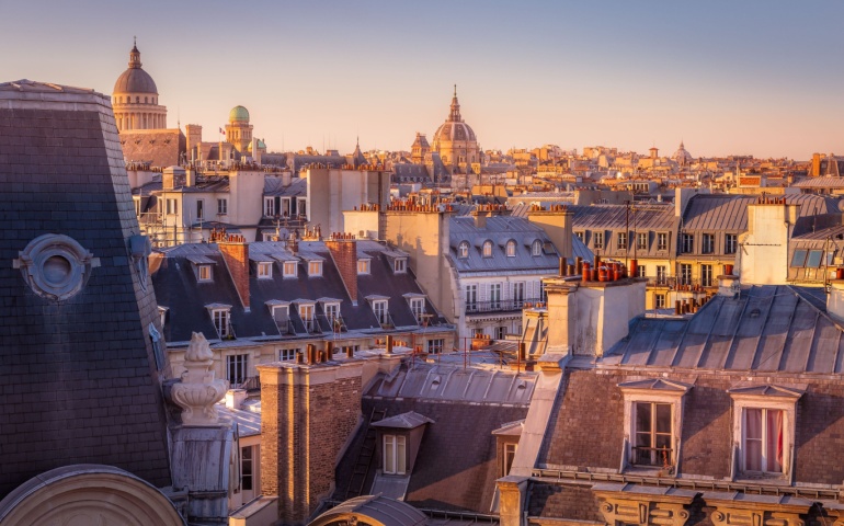 Pantheon and quarter Latin Parisian roofs at golden sunrise Paris, France. 
