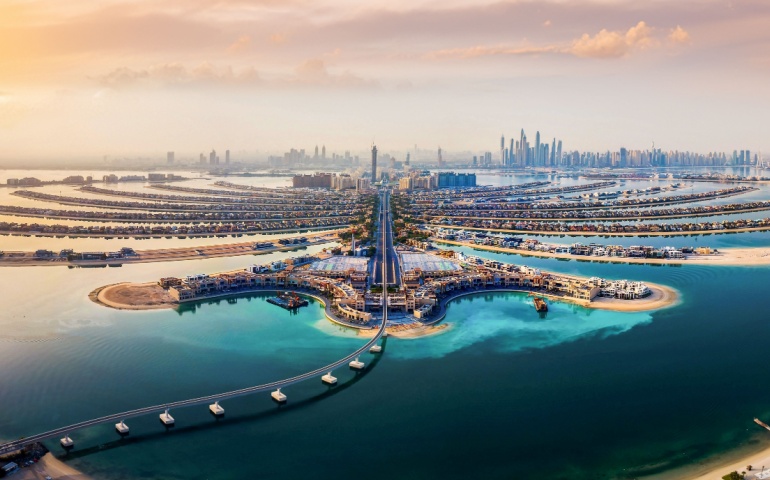 The Palm island panorama with Dubai marina in the background aerial
