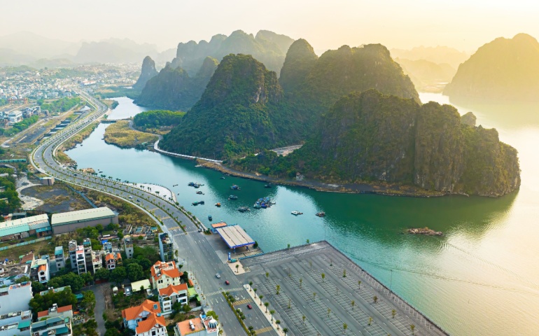 Aerial view floating fishing village and rock island, Halong Bay, Vietnam, Southeast Asia. 