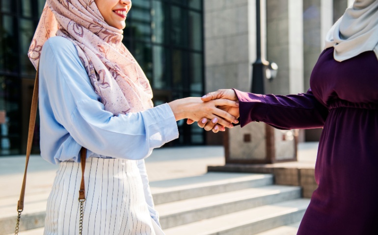 Women shaking hands