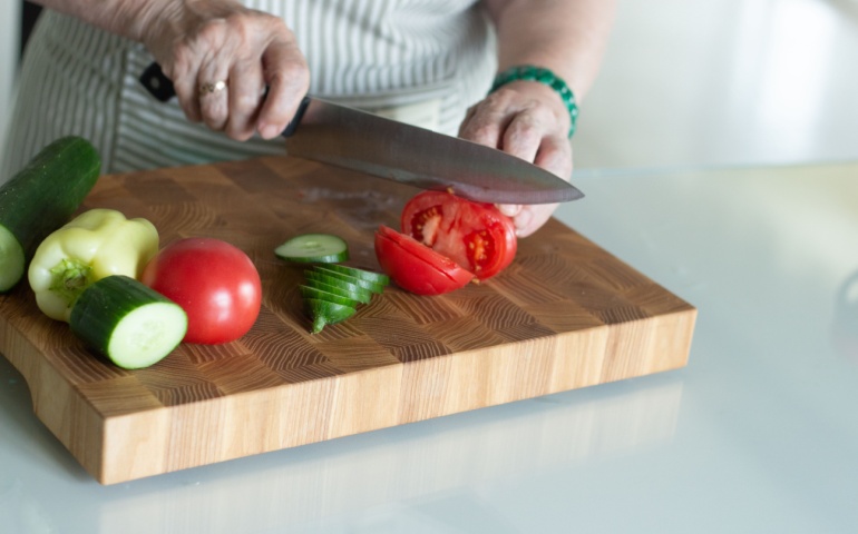 Woman cutting vegetables