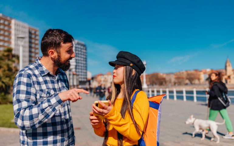 Man directing a woman