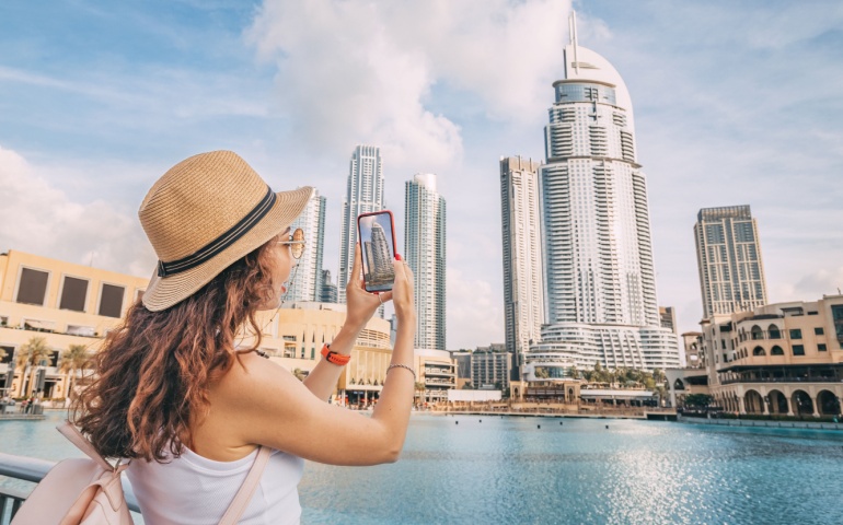 Woman clicking pictures in Downtown Dubai