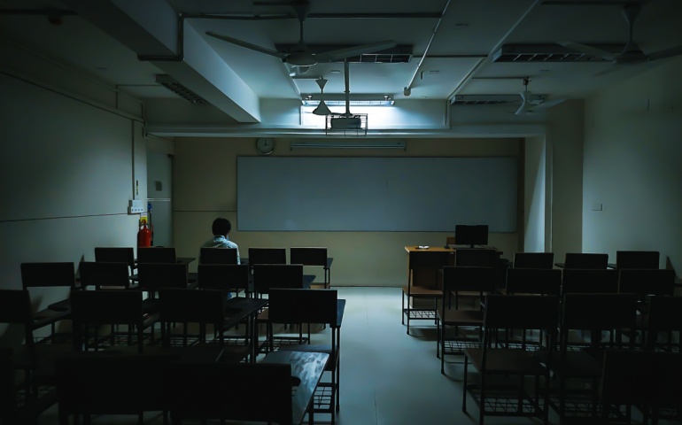 A dark classroom for representation purposes only