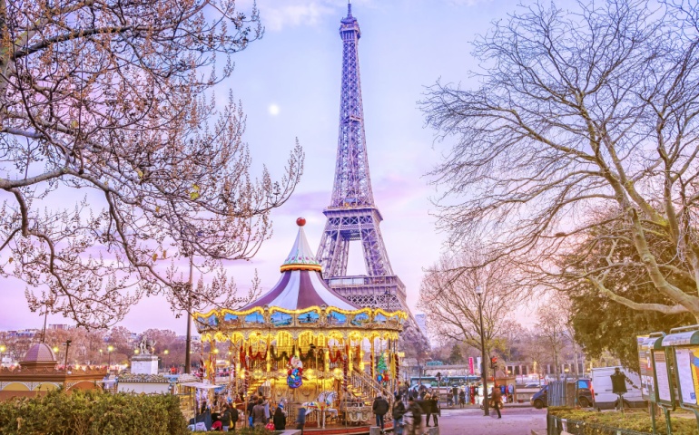 Scenery of the Eiffel Tower and vintage carousel