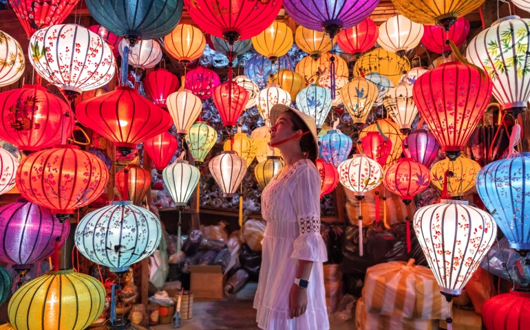 A woman choosing lanterns for the Hoi An Lantern Festival.