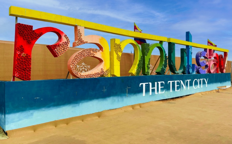 Decorative Rann Utsav board welcoming visitors to the Tent City