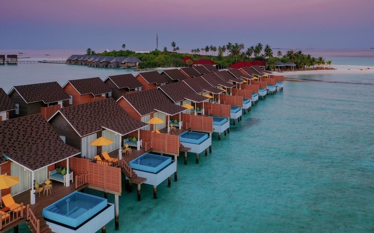 View of pool water villas at Dhigufaru Island