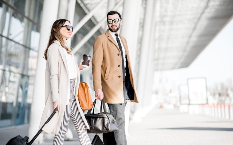 Business couple in coats