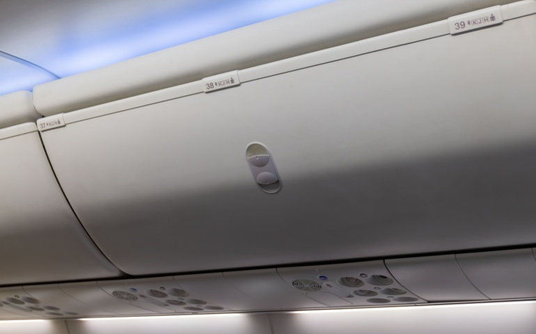 Do not open overhead bins