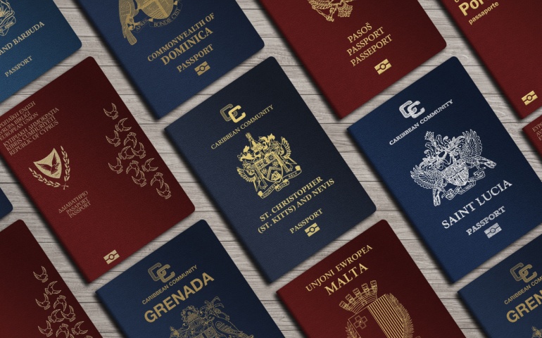 Aerial view of passports lying on a countertop.